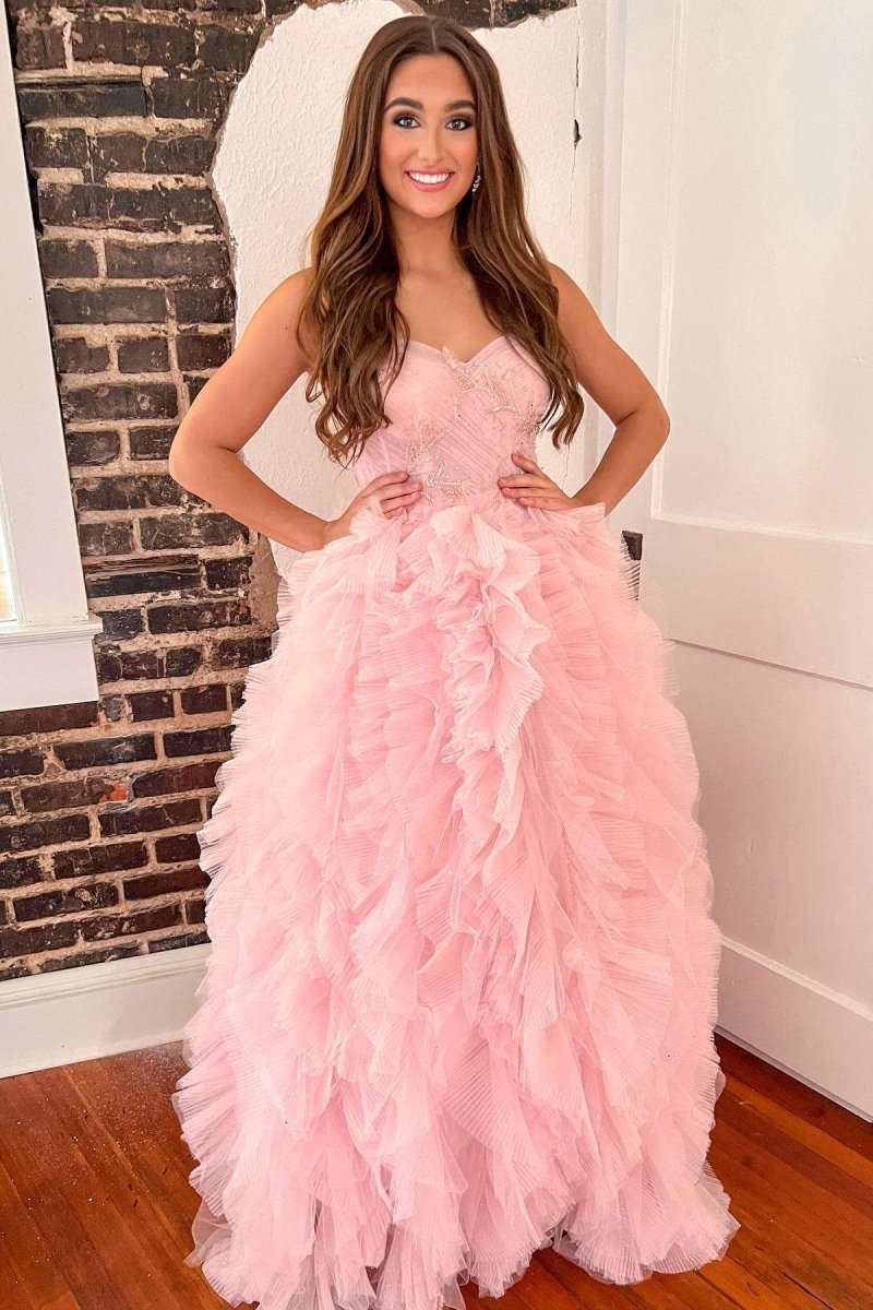 Vestido de fiesta sin tirantes, con volantes y cuentas en color rosa