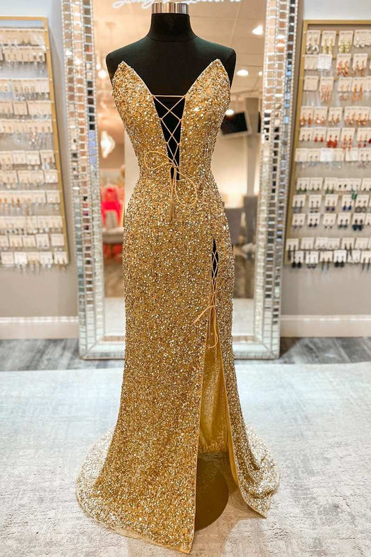 Vestido de fiesta largo con abertura y cordones en la parte delantera, sin tirantes y con lentejuelas doradas