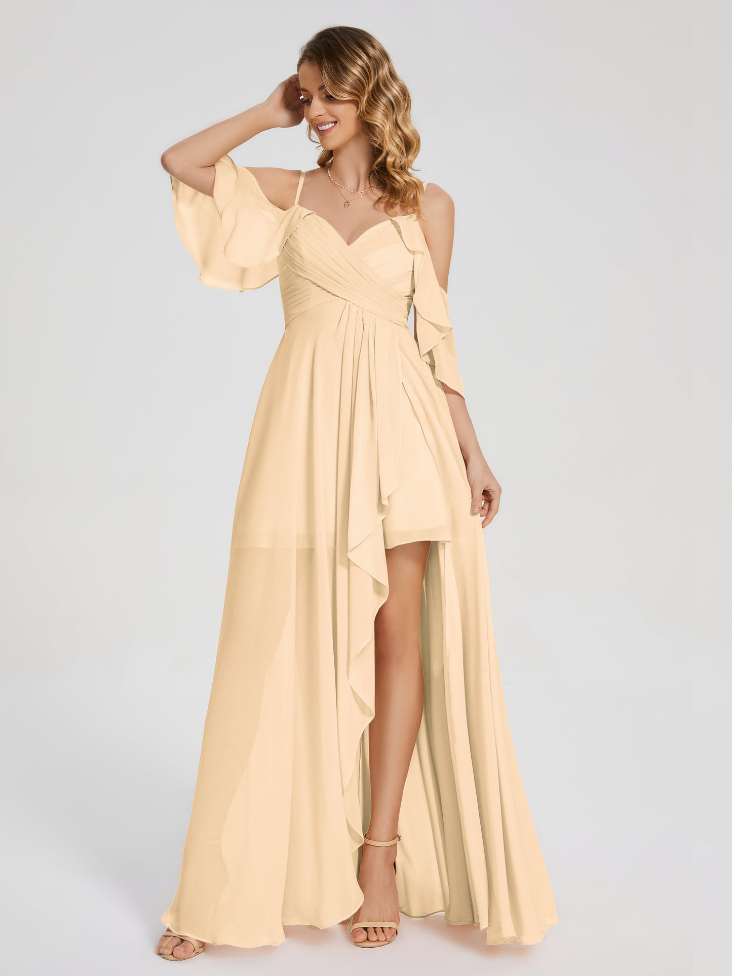 Vestido de fiesta de gasa con volantes y hombros descubiertos